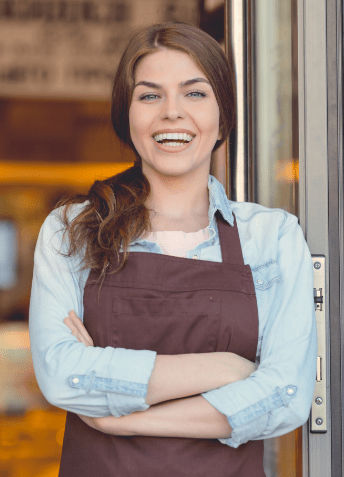 demo-attachment-400-smiling-woman-in-the-bakery-JYL-1